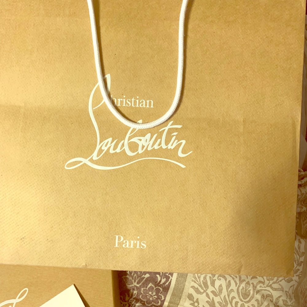 White Louboutin sneakers size 12